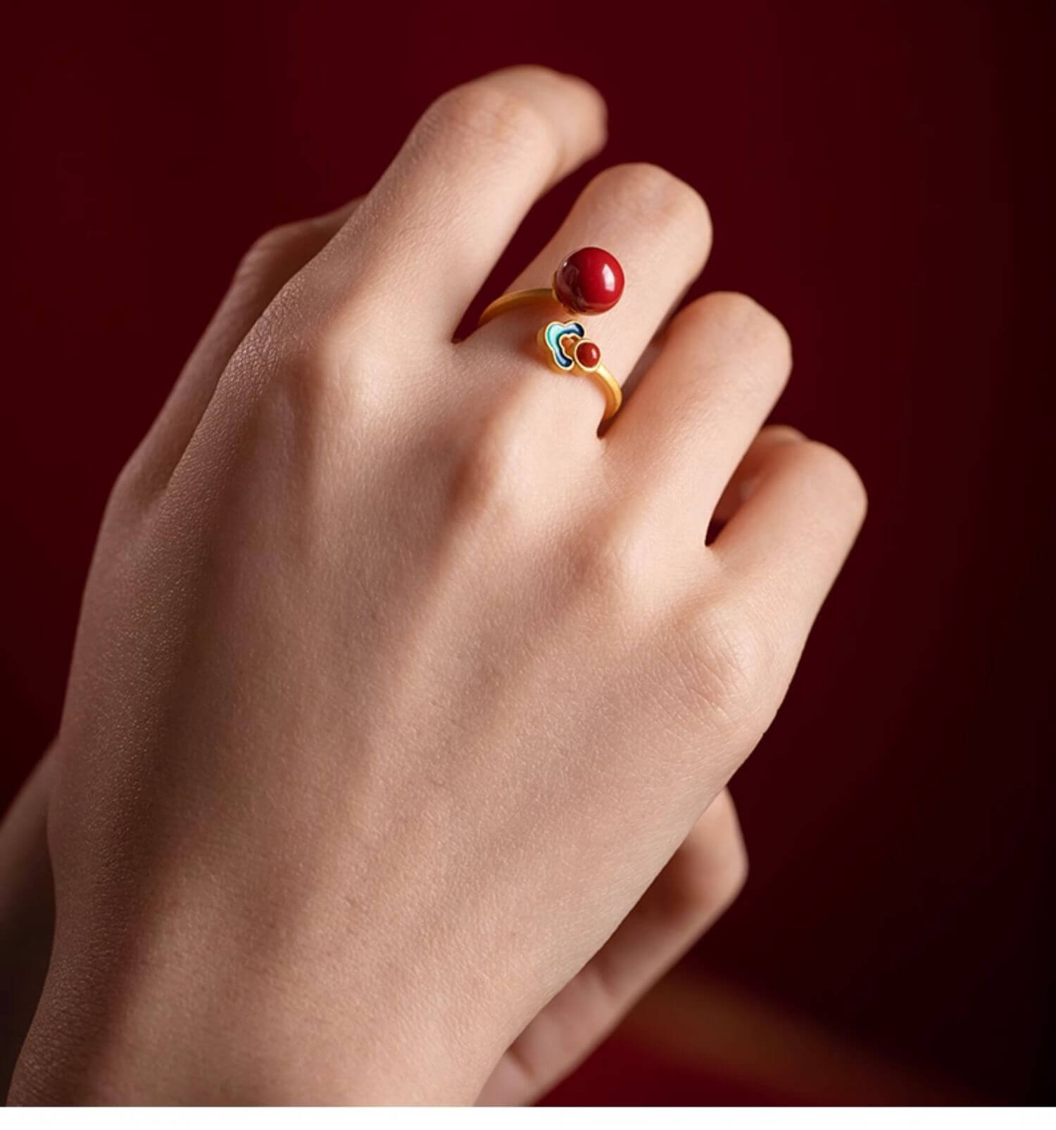 《The Auspicious Cloud Ring》 - A cinnabar ring featuring a new Chinese-style design with auspicious cloud motifs.