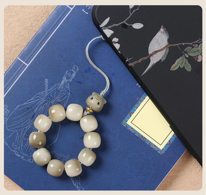 《Lucky Cat》 White Jade Bodhi Root Phone Charm