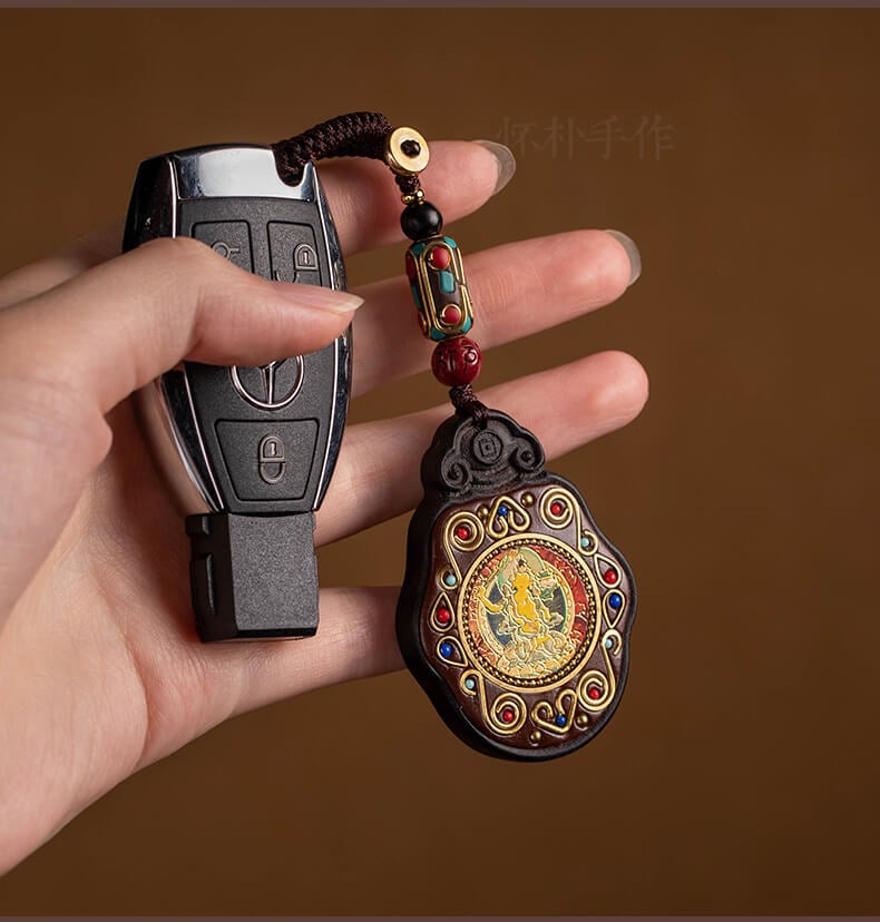  Wealth and well-being~Ebony wood pendant of the eight patron saints of Nepal